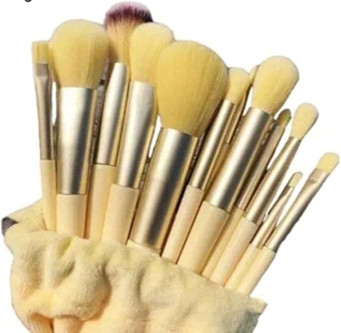 طقم فرش مكياج 13 قطعة مع شنطة لون أصفر